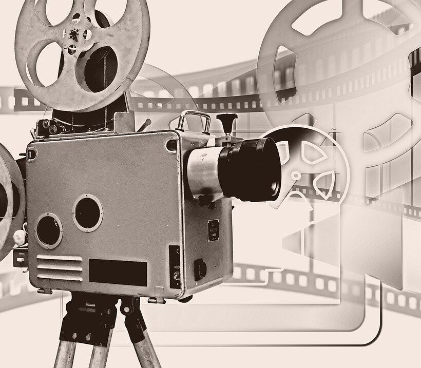 old-fashioned projector in sepia for corporate video script